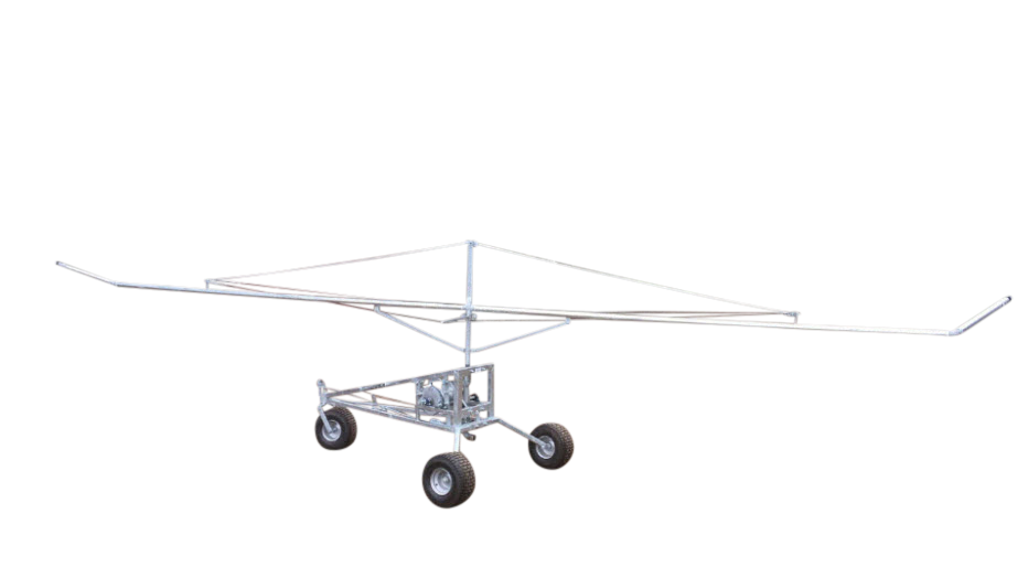 A 33 foot boom irrigator with a galvanized frame and wheels, designed for agricultural watering.